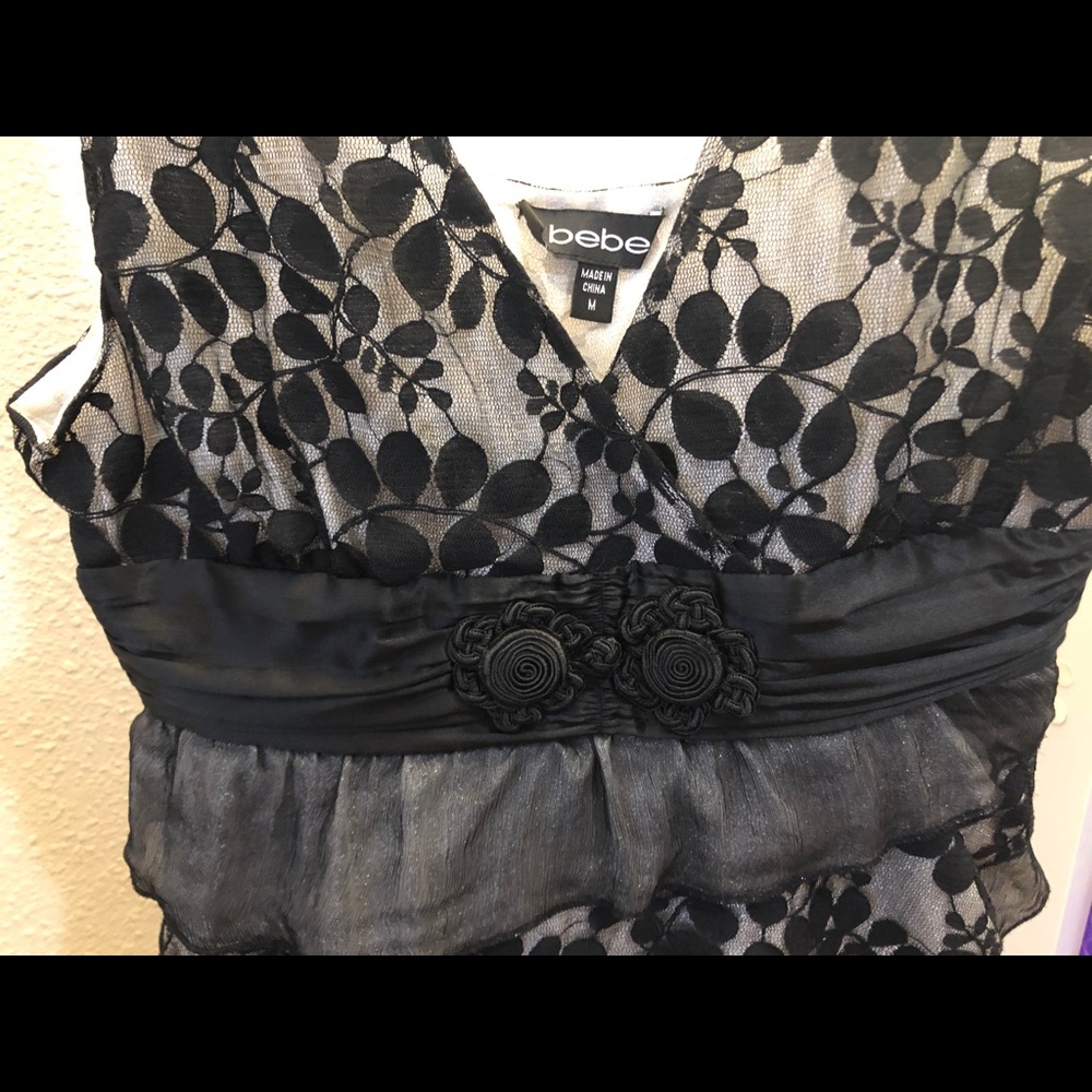 Bebe lace asymmetrical floral top!